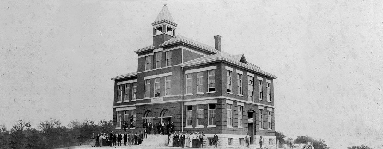 Black and white photo portrays Founder's Hall from 1887